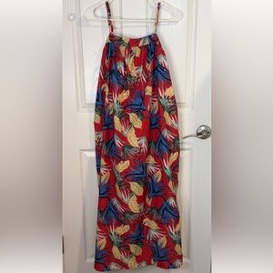 Tropical Red Maxi Sundress with Leaf Print lined inside . Adjustable straps .